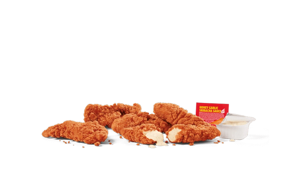 A serving of five crispy spicy chicken strips, arranged with a bite taken out of one to reveal the tender interior. Accompanied by a Honey Garlic Sriracha dipping sauce and a small container of creamy dip on transparent background.