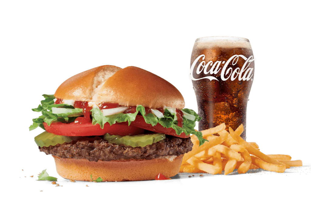 Featuring the Jumbo Jack® burger, a beef patty topped with fresh lettuce, tomato, and mayonnaise on a soft bun, paired with golden fries and a glass of Coca-Cola, all set against transparent background.