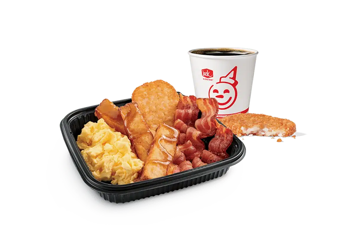 Image of a 3-piece Classic French Toast Sticks platter from Jack in the Box, complete with crispy bacon, scrambled eggs, and a cup of hot coffee. This delightful breakfast set is served in a black tray against a transparent background, featuring the cheerful Jack in the Box logo.