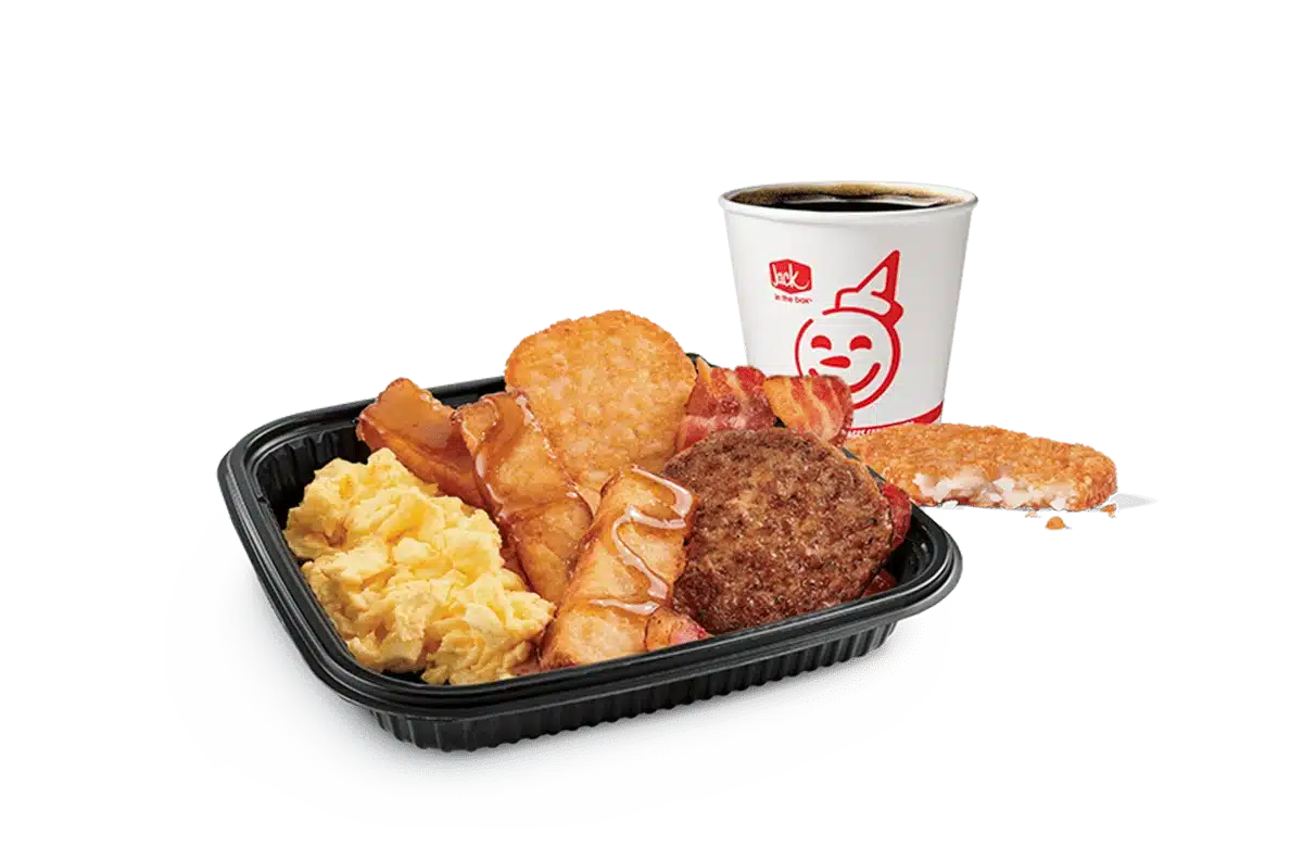 Image of a 3-piece Classic French Toast Sticks platter from Jack in the Box, featuring both crispy bacon and a savory sausage patty alongside scrambled eggs and a cup of hot coffee. This satisfying breakfast combo is served in a black tray against a transparent background, embellished with the cheerful Jack in the Box logo.