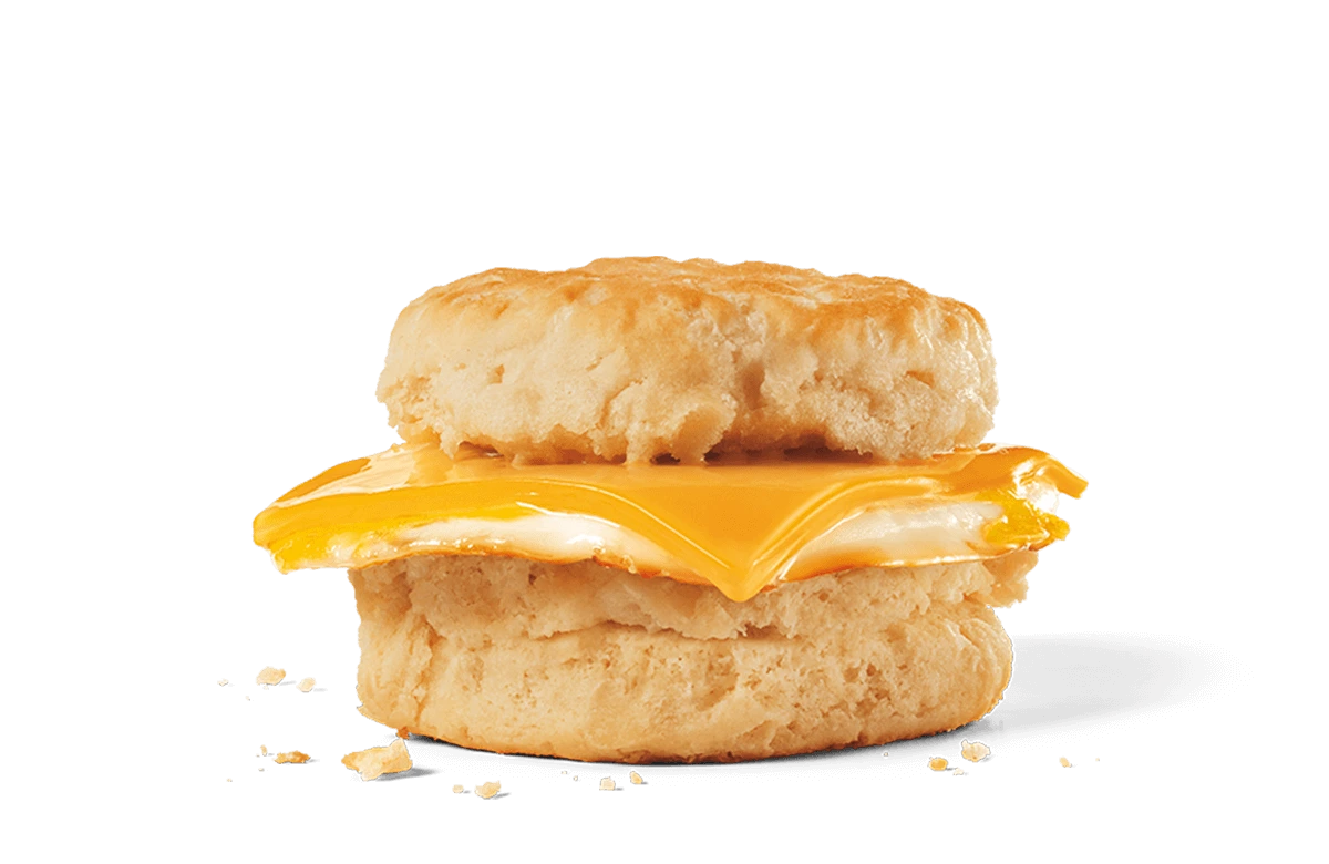 Image of an egg and cheese biscuit featuring a soft, flaky biscuit sandwiching a fluffy, fried egg topped with a slice of melted American cheese, making for a simple yet satisfying breakfast option.