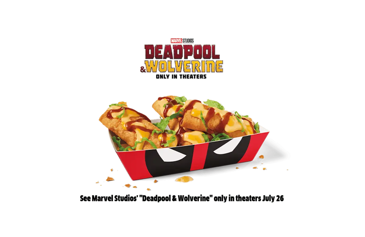 A tray of 3pc Sauced & Loaded Mini Chimi Bang Bangs from Jack in the Box, featuring crispy mini chimichangas topped with cheese sauce, barbecue drizzle, and fresh lettuce. The tray is styled with Deadpool’s signature red and black design. Promotional tie-in with Marvel Studios' "Deadpool & Wolverine," in theaters July 26.