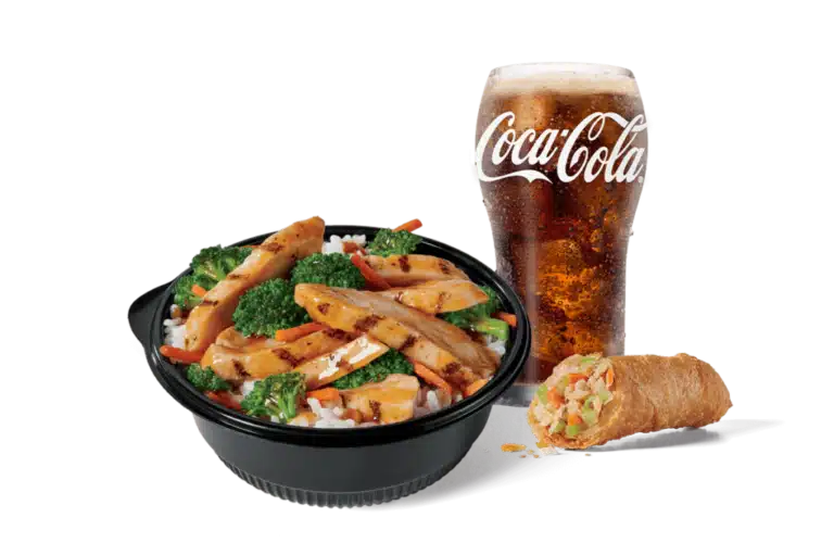 A hearty chicken teriyaki bowl filled with savory grilled chicken, vibrant broccoli, carrots over fried rice, accompanied by a crispy spring roll, and a glass of Coca-Cola with foam on top, set against a clear backdrop for a fulfilling meal.