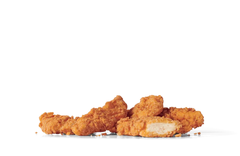 A group of crispy fried chicken strips with a golden-brown breading, arranged randomly on transparent background, with visible crunchy textures and a piece showing white meat inside.