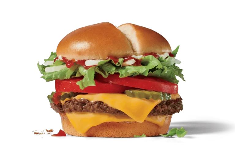 Image of a Jumbo Jack Cheeseburger with a beef patty, two slices of American cheese, fresh lettuce, thick tomato slices, and onions, topped with ketchup and mustard on a soft sesame seed bun.