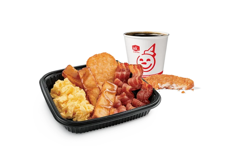 Image of a 3-piece Classic French Toast Sticks platter from Jack in the Box, complete with crispy bacon, scrambled eggs, and a cup of hot coffee. This delightful breakfast set is served in a black tray against a transparent background, featuring the cheerful Jack in the Box logo.