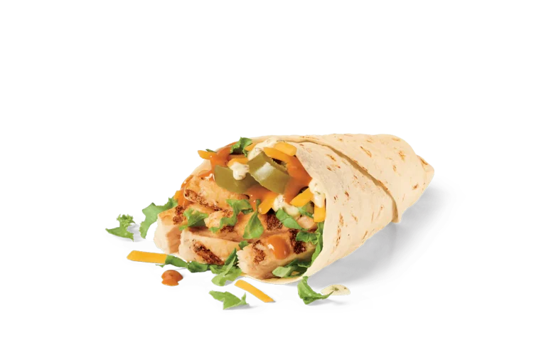 A halved spicy grilled jack wrap against transparent background. The wrap is filled with chunks of grilled chicken, melted jack cheese, fresh lettuce, diced green peppers, and a spicy orange sauce, with bits of the filling spilling onto the surface below.