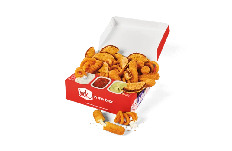 A box filled with a variety of Jack in the Box's fan-favorite side items, including curly fries, potato wedges, and mozzarella sticks, served with dipping sauces of ranch, ketchup, and avocado.