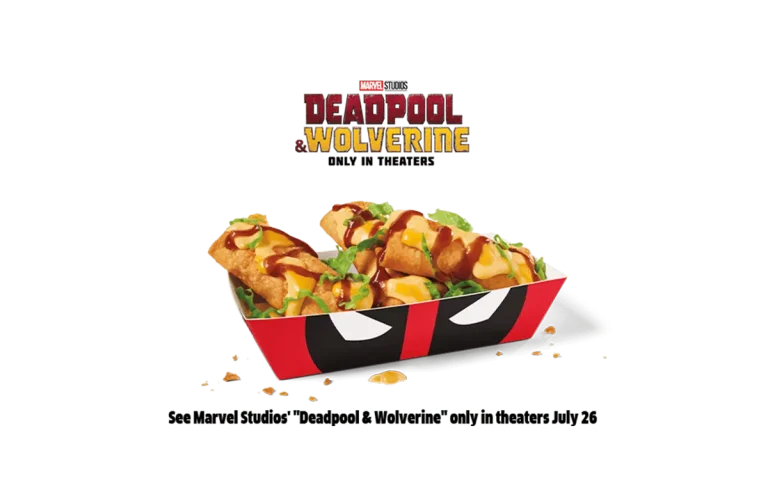 A tray of 3pc Sauced & Loaded Mini Chimi Bang Bangs from Jack in the Box, featuring crispy mini chimichangas topped with cheese sauce, barbecue drizzle, and fresh lettuce. The tray is styled with Deadpool’s signature red and black design. Promotional tie-in with Marvel Studios' "Deadpool & Wolverine," in theaters July 26.