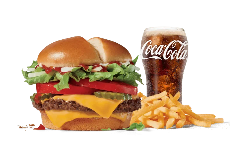 A delicious cheeseburger with fresh lettuce, tomato, pickles, and melted cheese, served with crispy French fries and a refreshing glass of Coca-Cola.